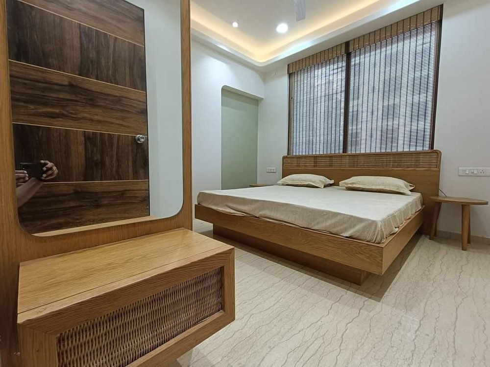 Custom wooden bed with dresser unit, Vadodara home interior