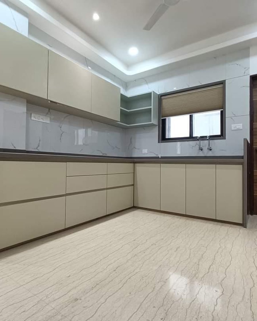 Completed kitchen and wooden door interior by AtoZ Doors and Windows, Vadodara